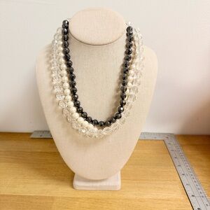 Crystal medium formal three strand necklace with clear, gray, and faux pearl